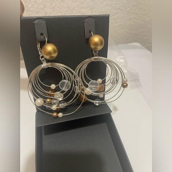 Subversive Silver Toned Hoop Earrings - Picture 1 of 8